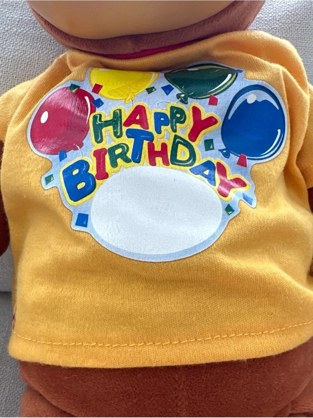 Curious Monkey Plush Toy in Brown with Yellow 'Happy Birthday' Shirt